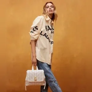 KARL LAGERFELD LAFAYETTE BACKPACK WHITE LEATHER CUTOUT VINTAGE GOLD HARDWARE NWT Karl Lagerfeld | Bags | Karl Lagerfeld Lafayette Backpack  main image 2
